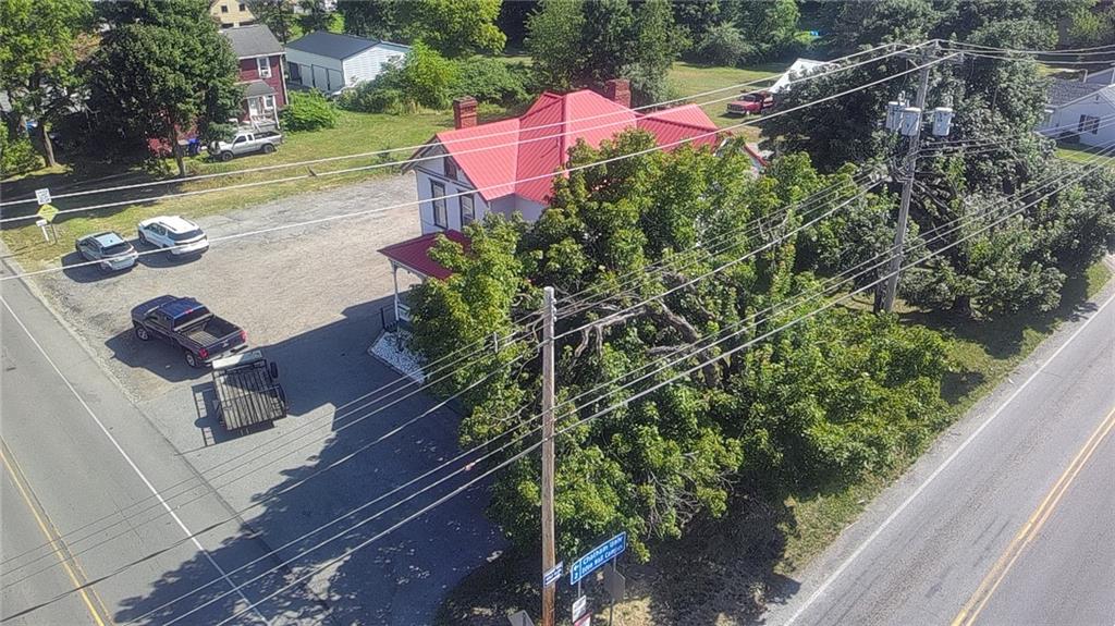 5910 Heckert Road Bakerstown, PA 15007 - Photo 15 of 18 an aerial view of a house with yard swimming pool and red chairs