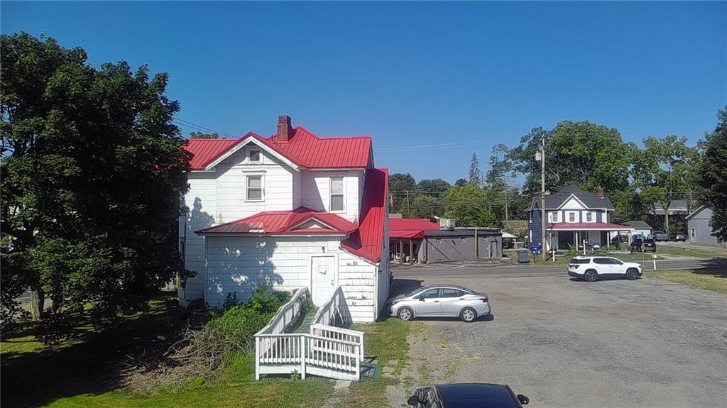 5910 Heckert Road Bakerstown, PA 15007 - Photo 2 of 18 a front view of a building with parked cars