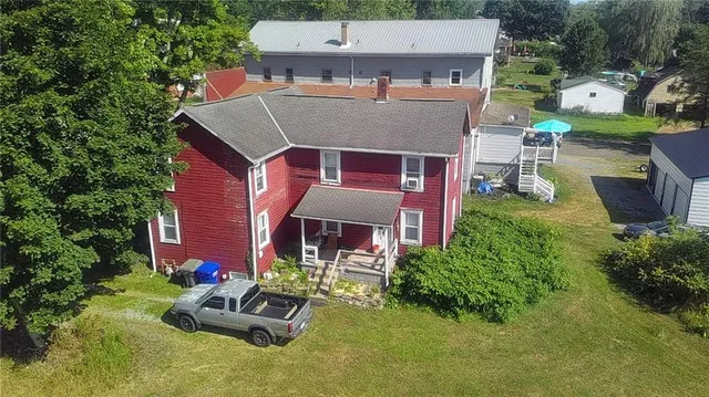 an aerial view of a house with garden