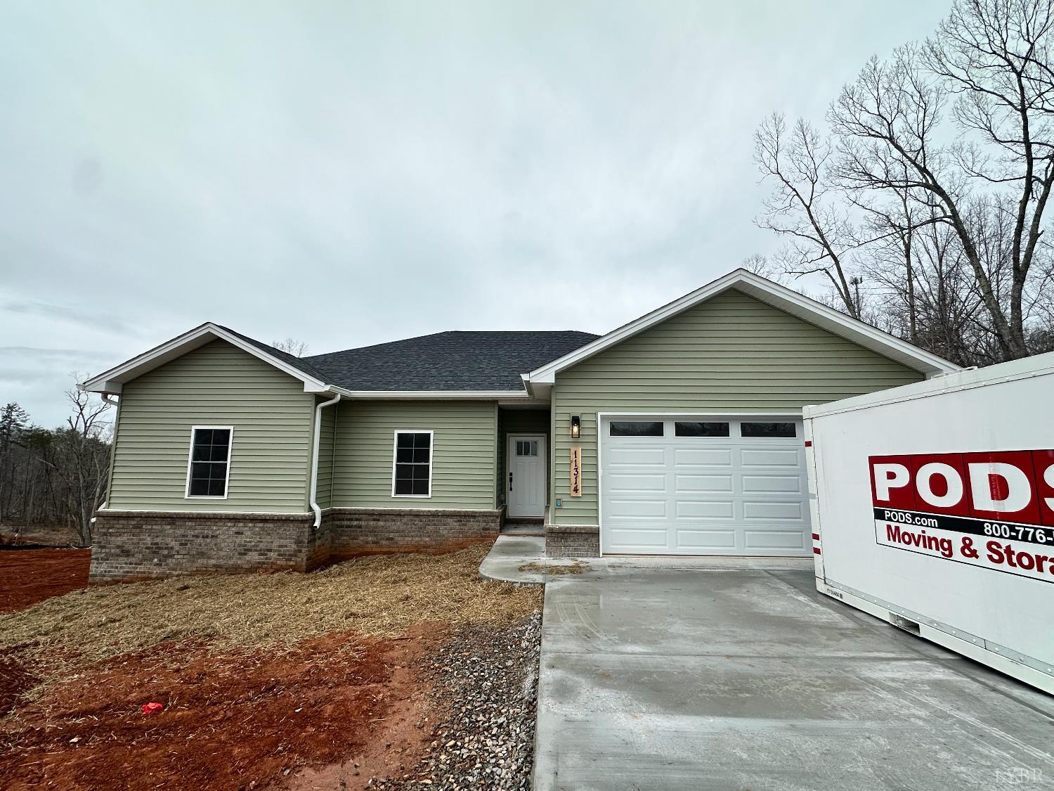 a view of outdoor space yard and garage