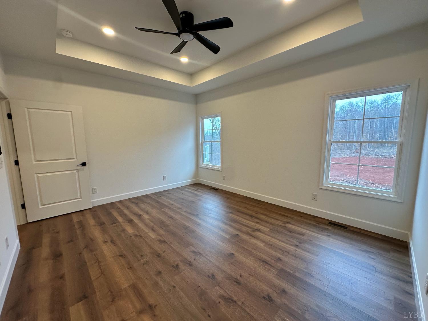 11314 Leesville Road Evington, VA 24550 - Photo 18 of 28 wooden floor in an empty room with a window