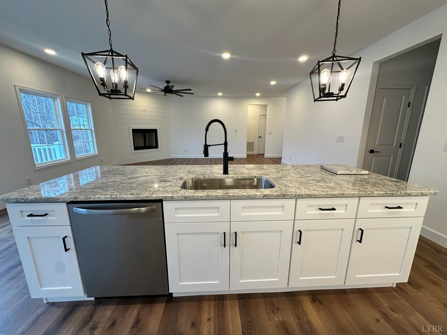 11314 Leesville Road Evington, VA 24550 - Photo 8 of 28 a kitchen with white cabinets and sink