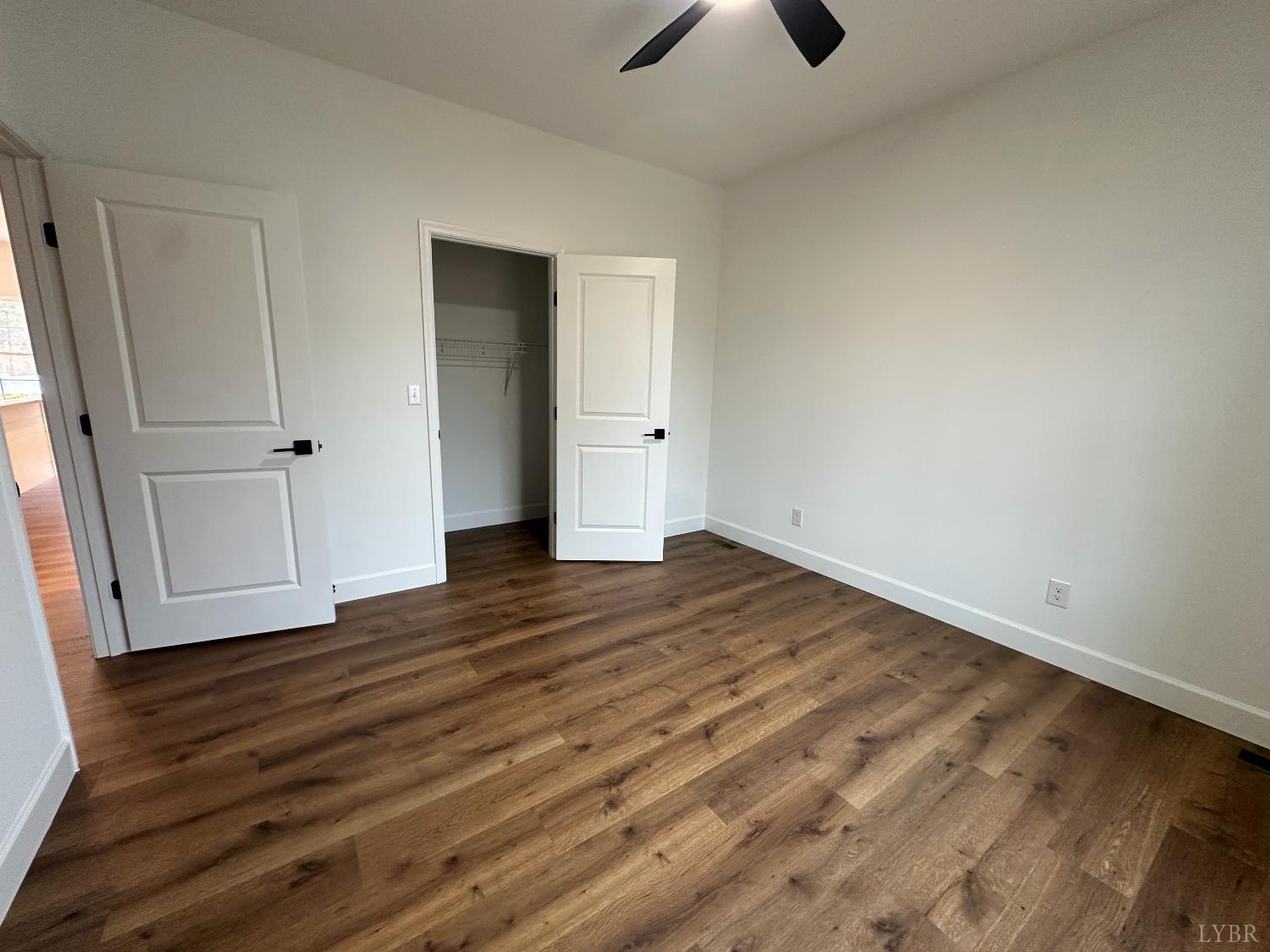 11314 Leesville Road Evington, VA 24550 - Photo 9 of 28 wooden floor in an empty room