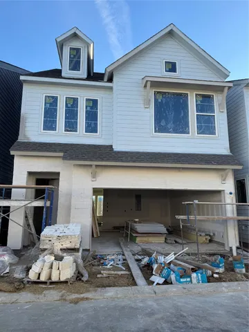 a front view of a house with parking