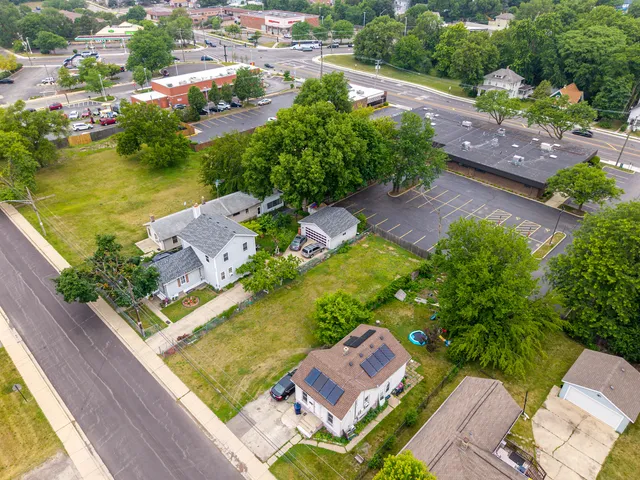 an aerial view of a house with a garden