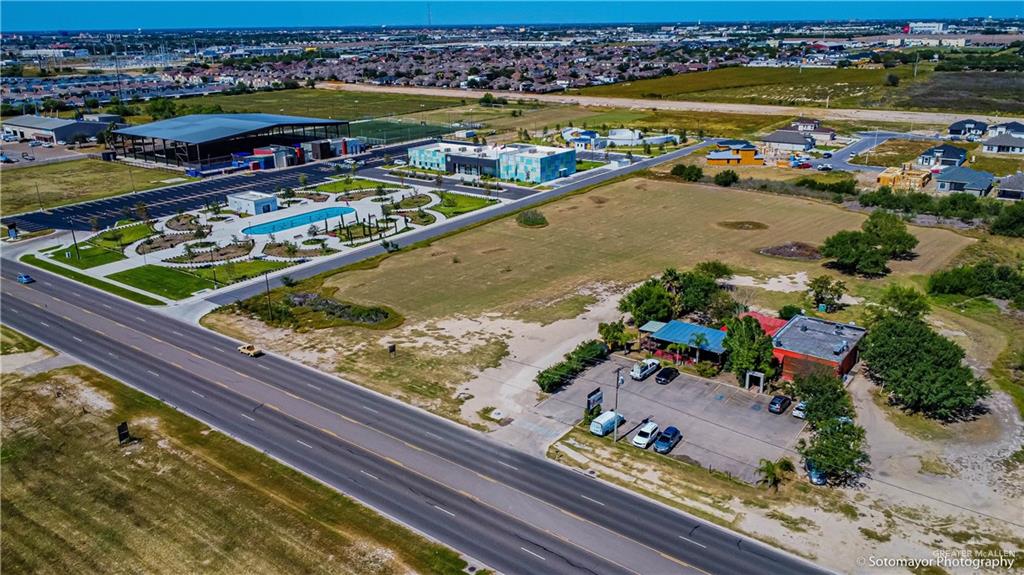 1209 East Nolana Loop Pharr, TX 78577 - Photo 6 of 18 an aerial view of swimming pool with a lawn chairs