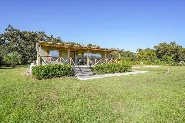a house view with a garden space