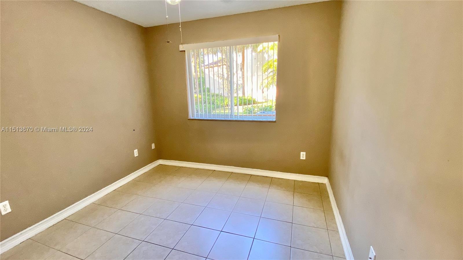 460 South Park Road, Unit 6103 Hollywood, FL 33021 - Photo 7 of 15 a view of an empty room with a window