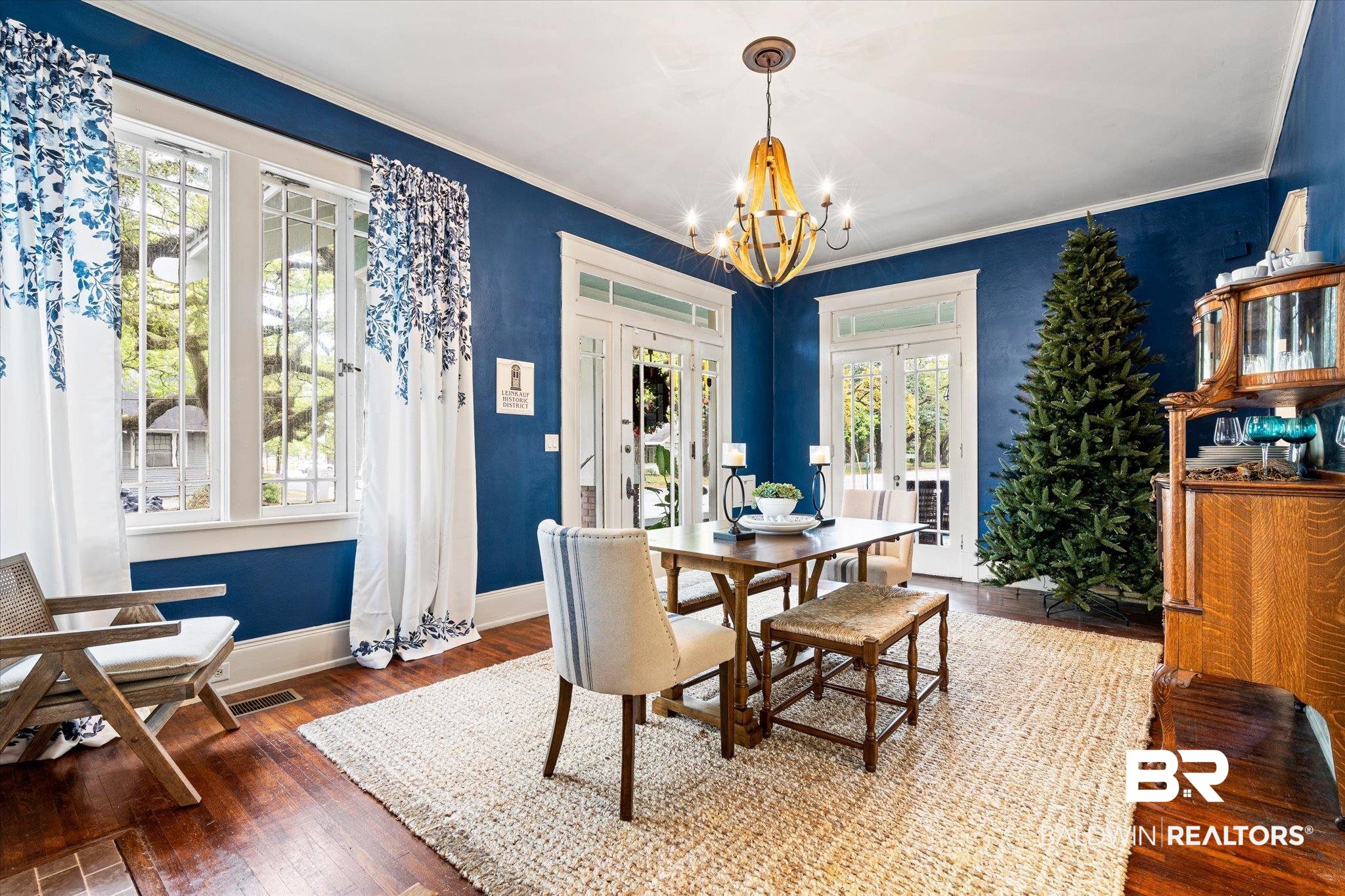 466 Michigan Avenue Mobile, AL 36604 - Photo 16 of 38 Dining area with a chandelier, french doors, dark hardwood / wood-style flooring, and a healthy amount of sunlight