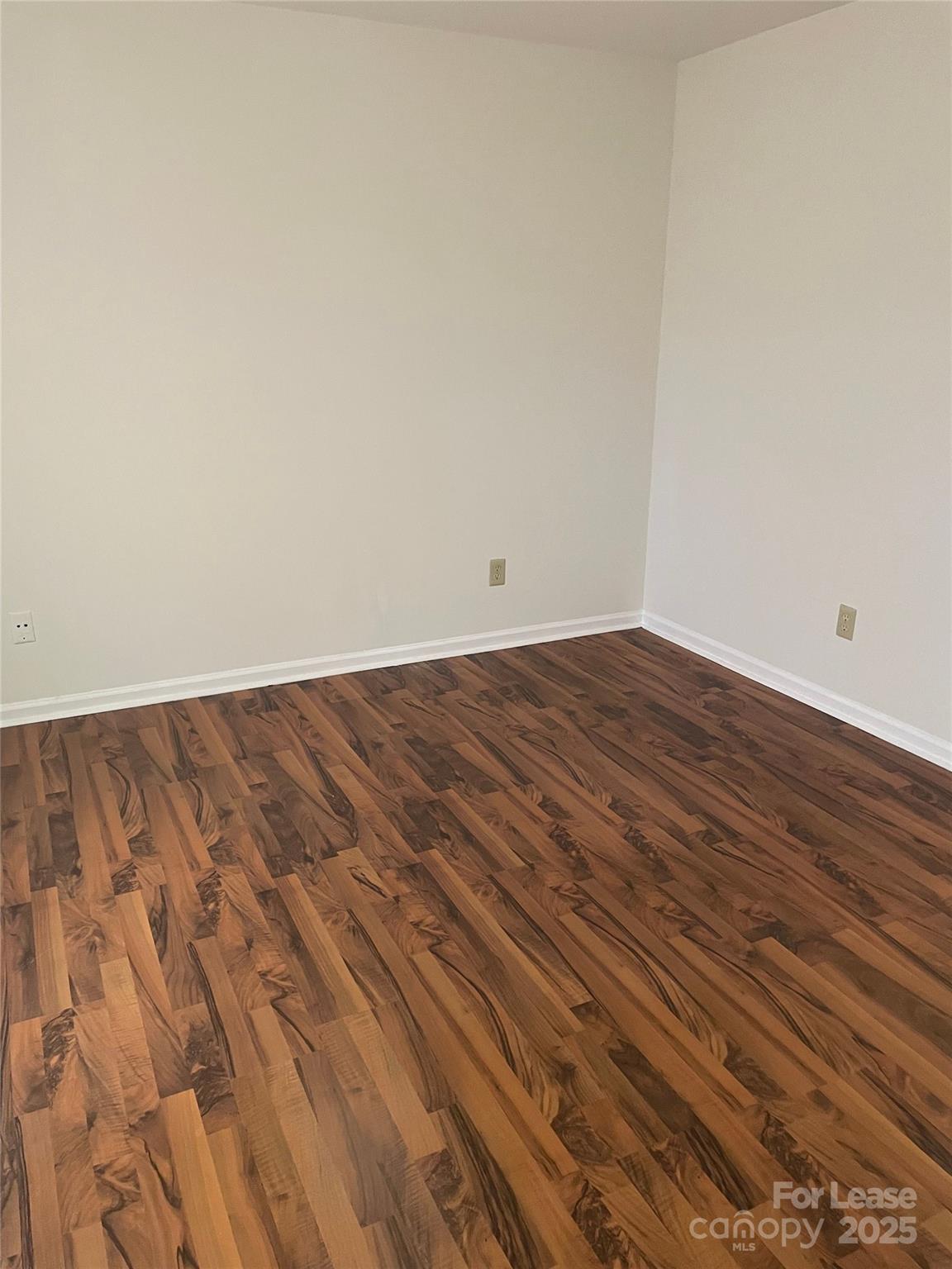 6700 Bevington Ridge Road Charlotte, NC 28277 - Photo 6 of 7 a view of a room with wooden floor