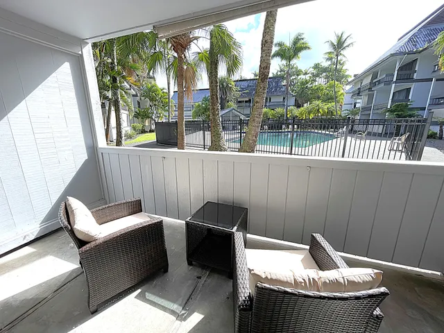 a building view with a outdoor seating