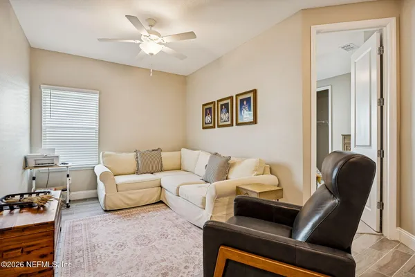 a bedroom with furniture and a couch