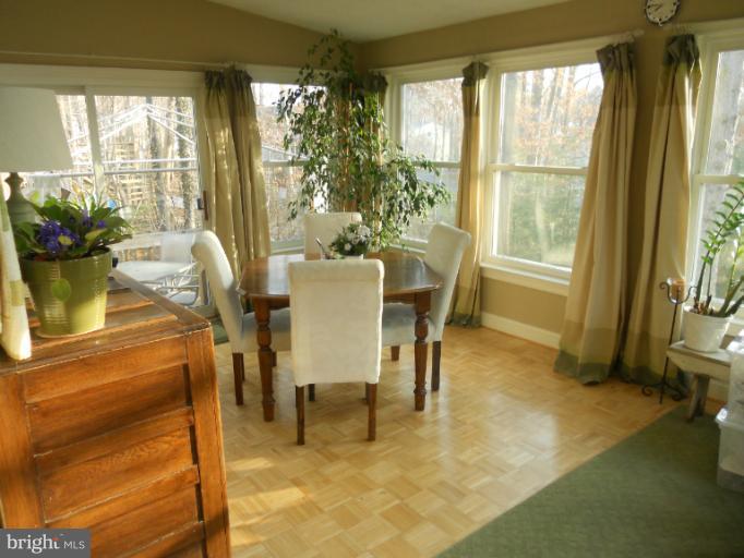 8065 Athena Street Springfield, VA 22153 - Photo 14 of 30 Sun Room Dining Area