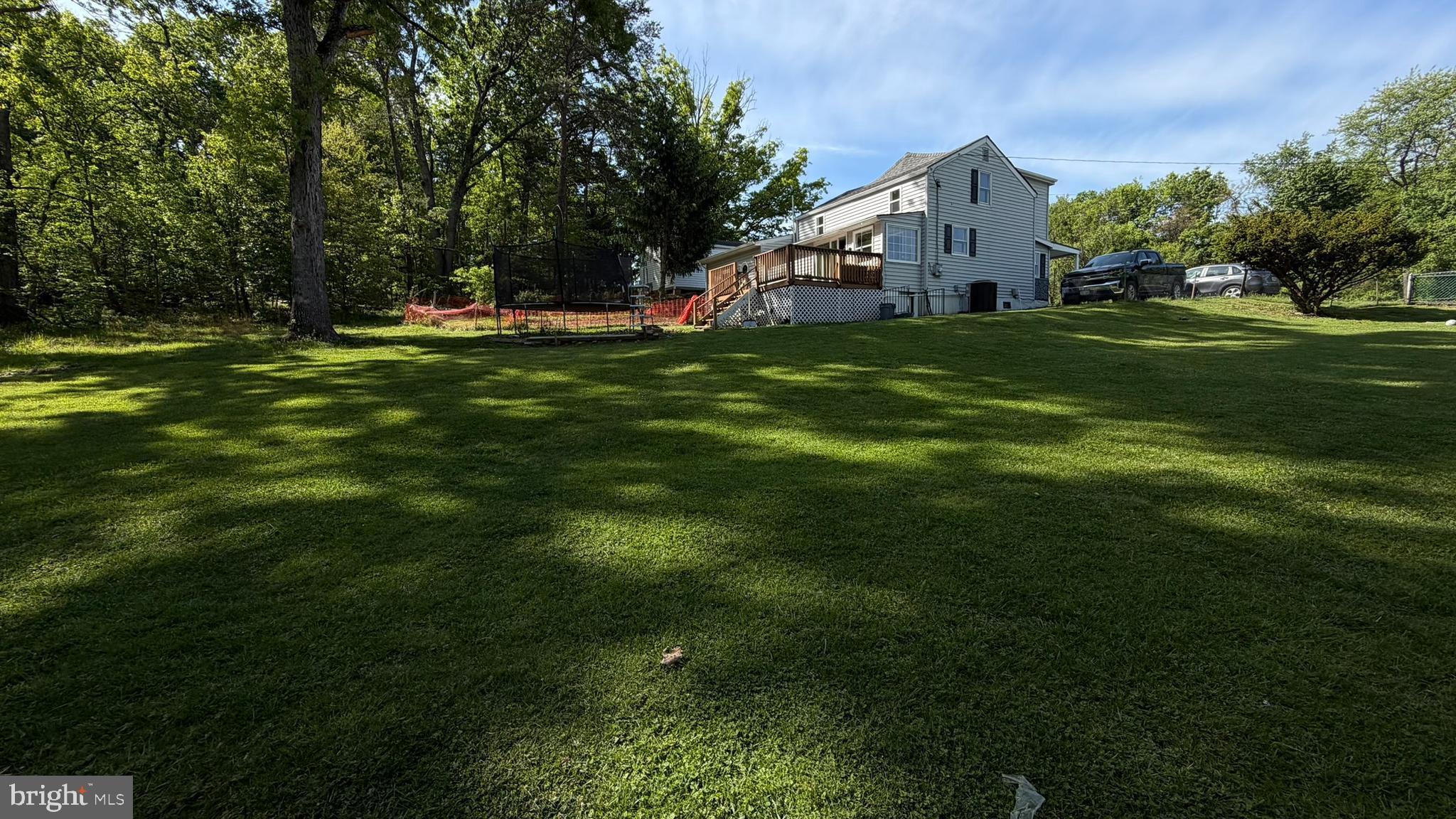 45 Figgins Road Front Royal, VA 22630 - Photo 17 of 17 a view of a house with a big yard and large trees