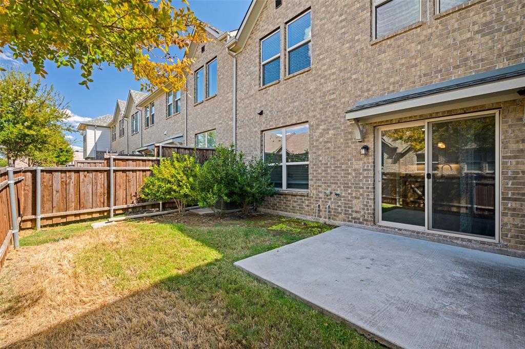 2741 Splendor Lane Little Elm, TX 75068 - Photo 25 of 32 Backyard with patio, and shade tree.