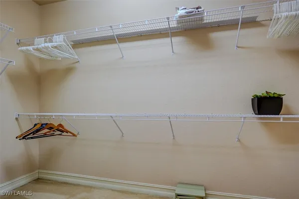 a view of a room with racks on the wall