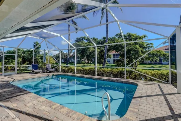 a view of a backyard with a patio