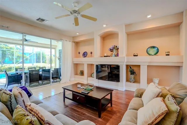 a living room with furniture and a table