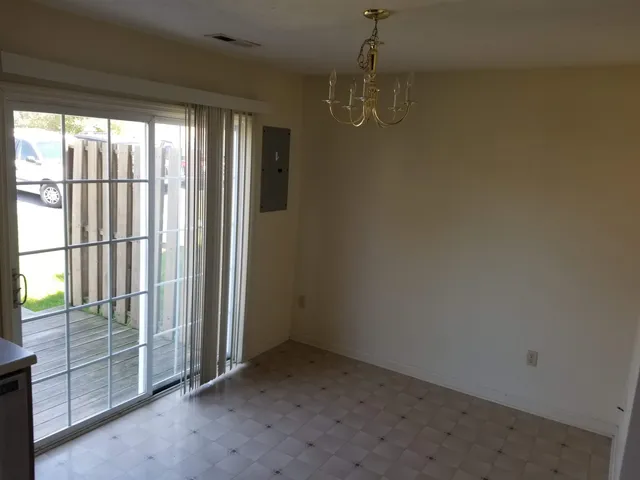 en empty room with windows