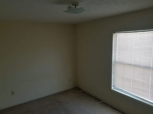 an empty room with a window