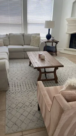 a living room with furniture and a couch