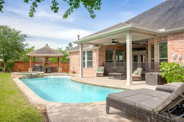front view of a house with swimming pool