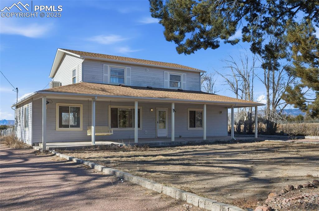 747 D Street Penrose, CO 81240 - Photo 2 of 36 a front view of a house