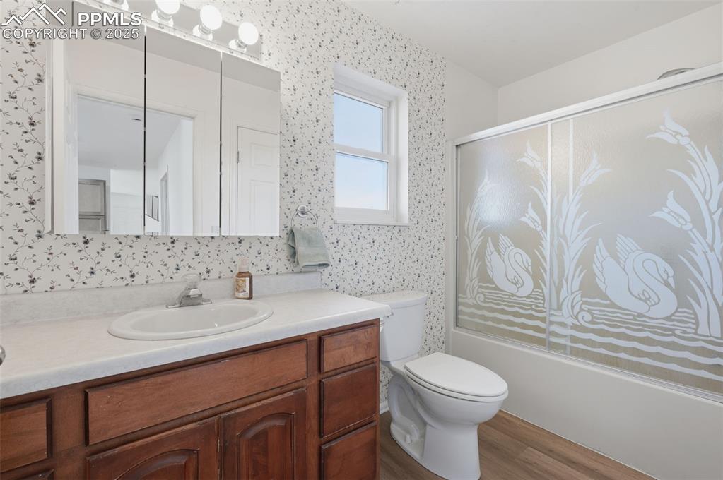 747 D Street Penrose, CO 81240 - Photo 22 of 36 a bathroom with a sink toilet and shower