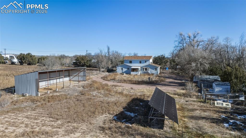 747 D Street Penrose, CO 81240 - Photo 31 of 36 a view of a backyard with sitting area