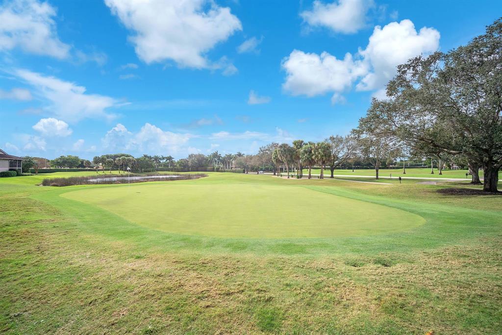 22710 Meridiana Drive Boca Raton, FL 33433 - Photo 33 of 39 a view of a large body of water with lots of trees