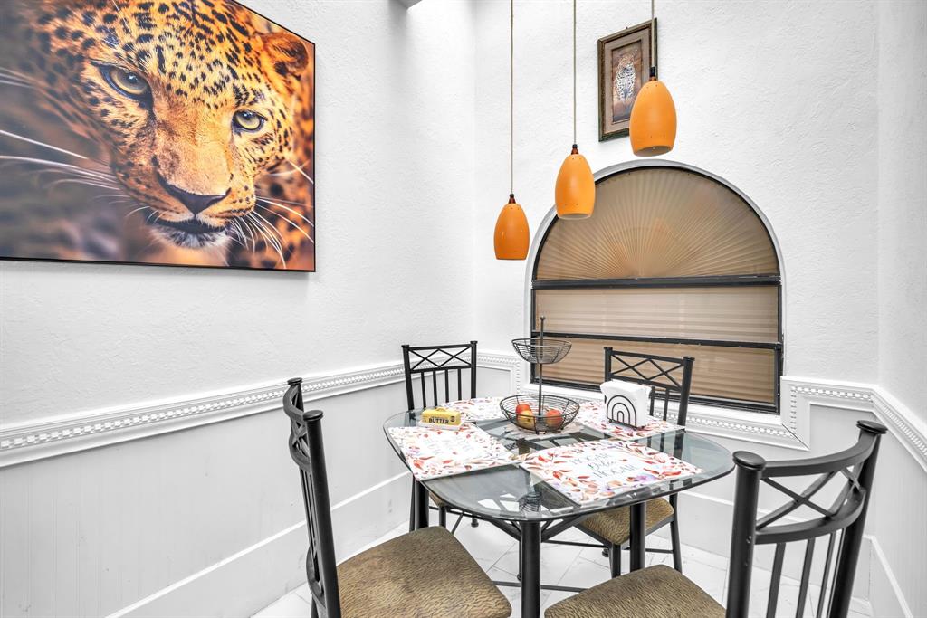 22710 Meridiana Drive Boca Raton, FL 33433 - Photo 7 of 39 a view of a dining room with furniture and wooden floor