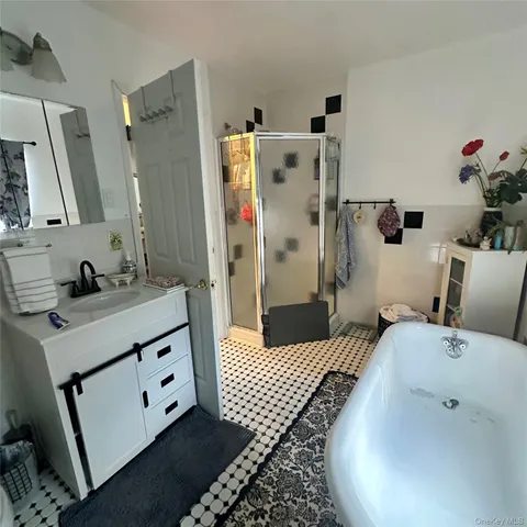 a bathroom with a sink and mirror