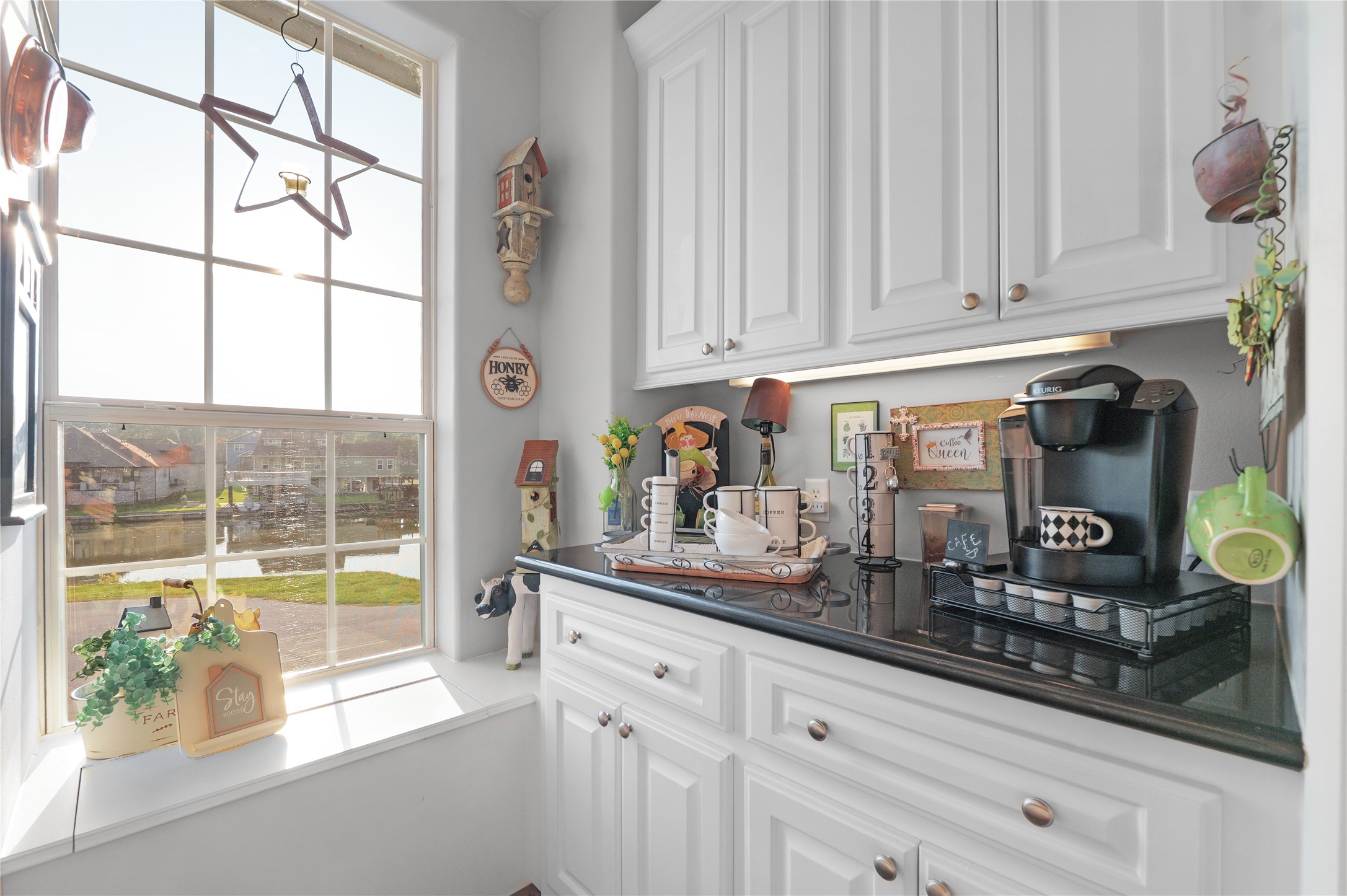 11 Lookout Ridge Huntsville, TX 77340 - Photo 15 of 45 a kitchen with stainless steel appliances granite countertop a sink and a window
