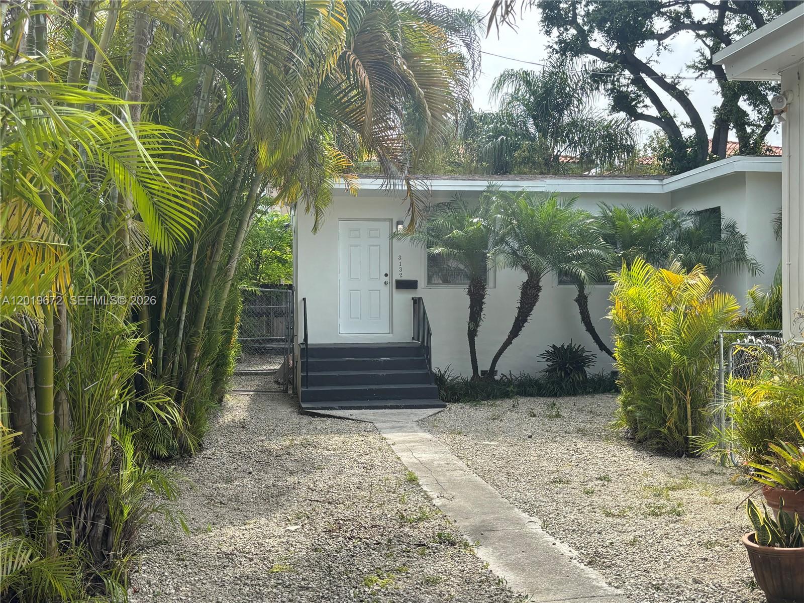 3132 Elizabeth Street, Unit B Miami, FL 33133 - Photo 1 of 14 a view of a garden with plants