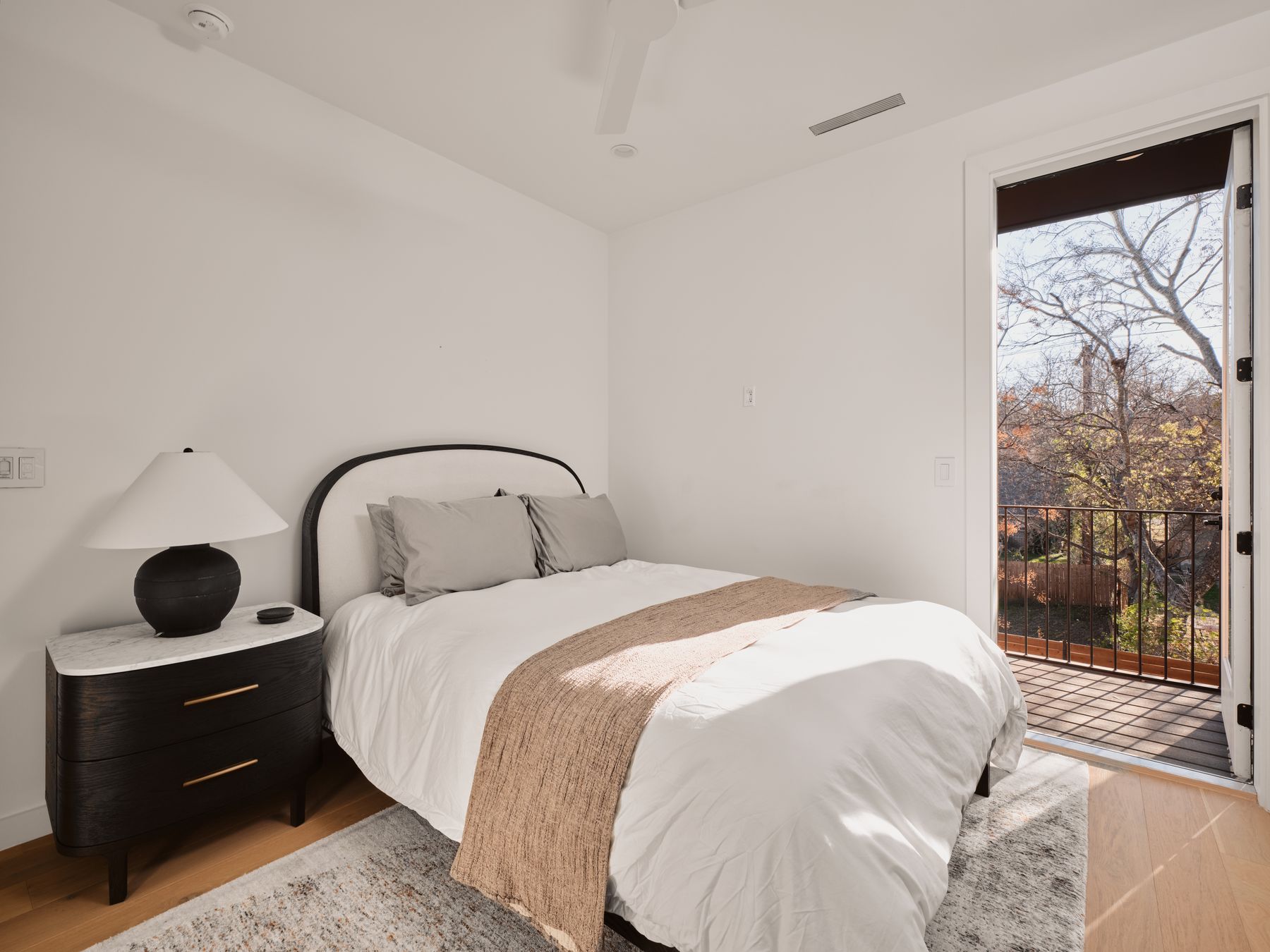 3209 Clawson Road Austin, TX 78704 - Photo 26 of 30 a bedroom with a bed and window