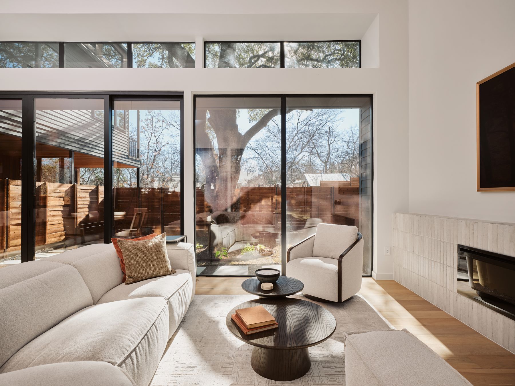 3209 Clawson Road Austin, TX 78704 - Photo 7 of 30 a living room with furniture and a floor to ceiling window