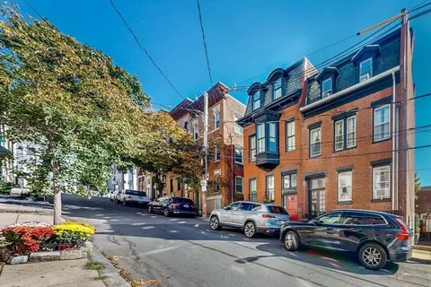 a car parked in front of a building