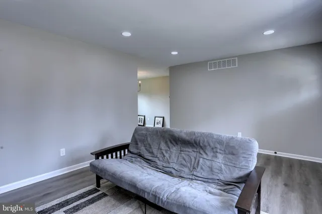 a living room with furniture and a couch