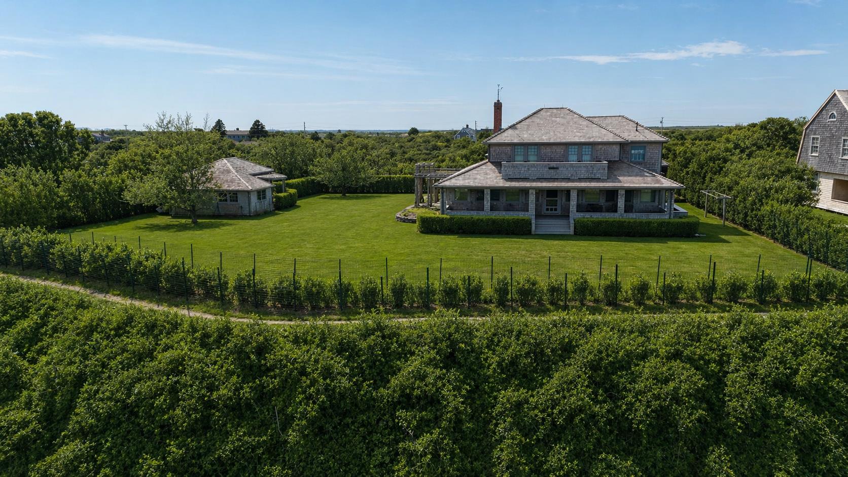 59 Baxter Road Nantucket, MA 02554 - Photo 3 of 8 a view of a house with a yard
