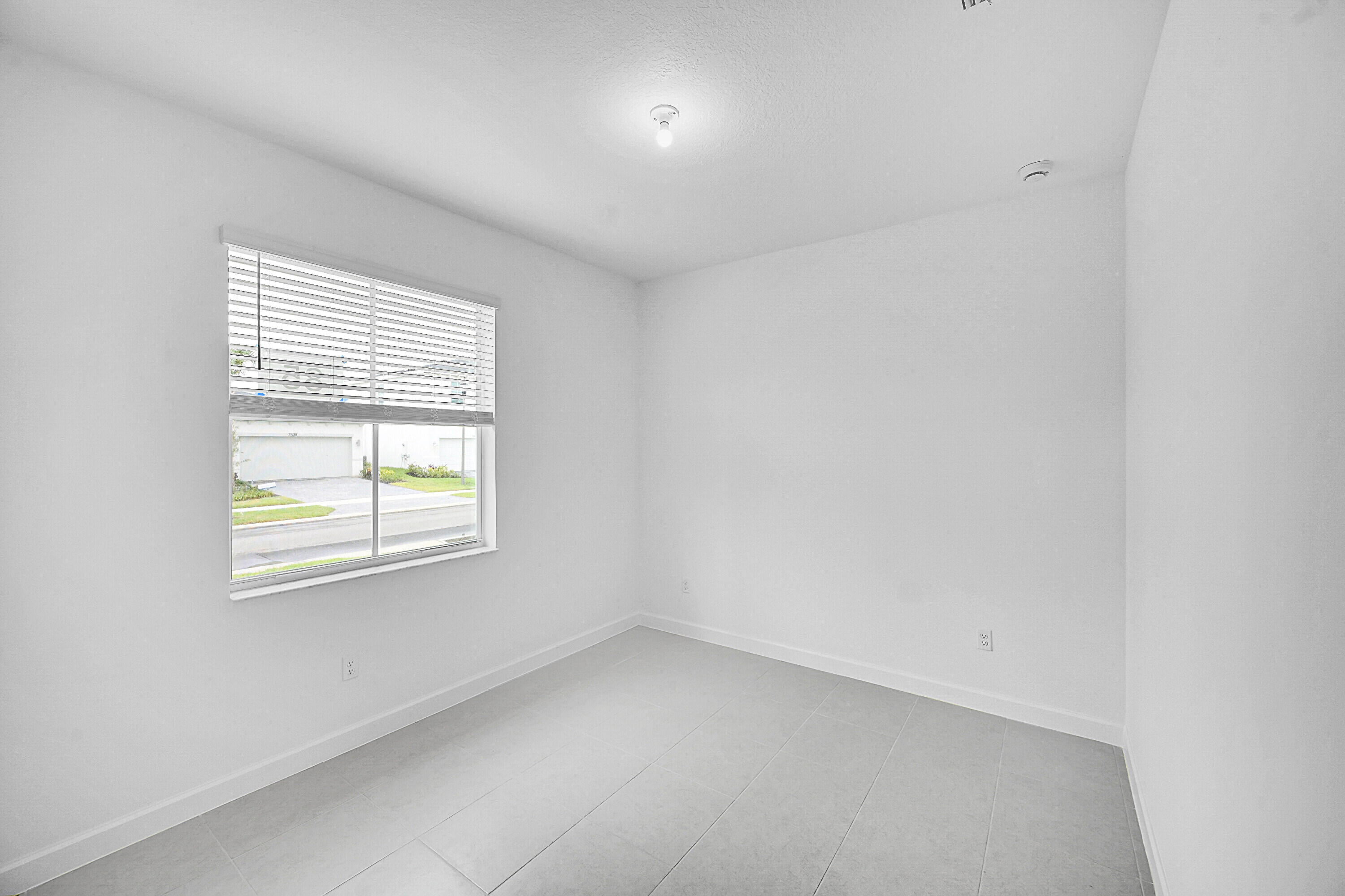 3532 Angler Drive Fort Pierce, FL 34946 - Photo 5 of 31 an empty room with a window