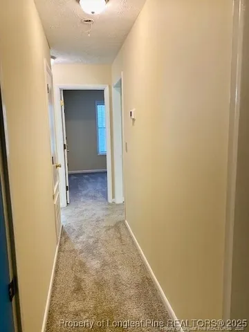 a view of a balcony with wooden floor