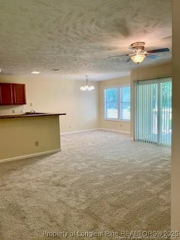 a view of a livingroom with furniture