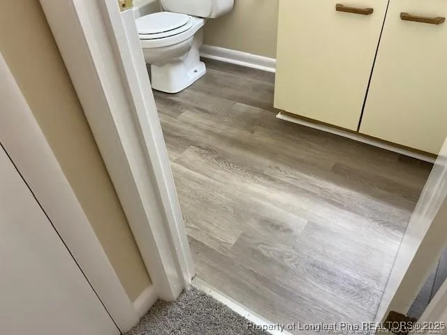 a bathroom with a toilet and a sink
