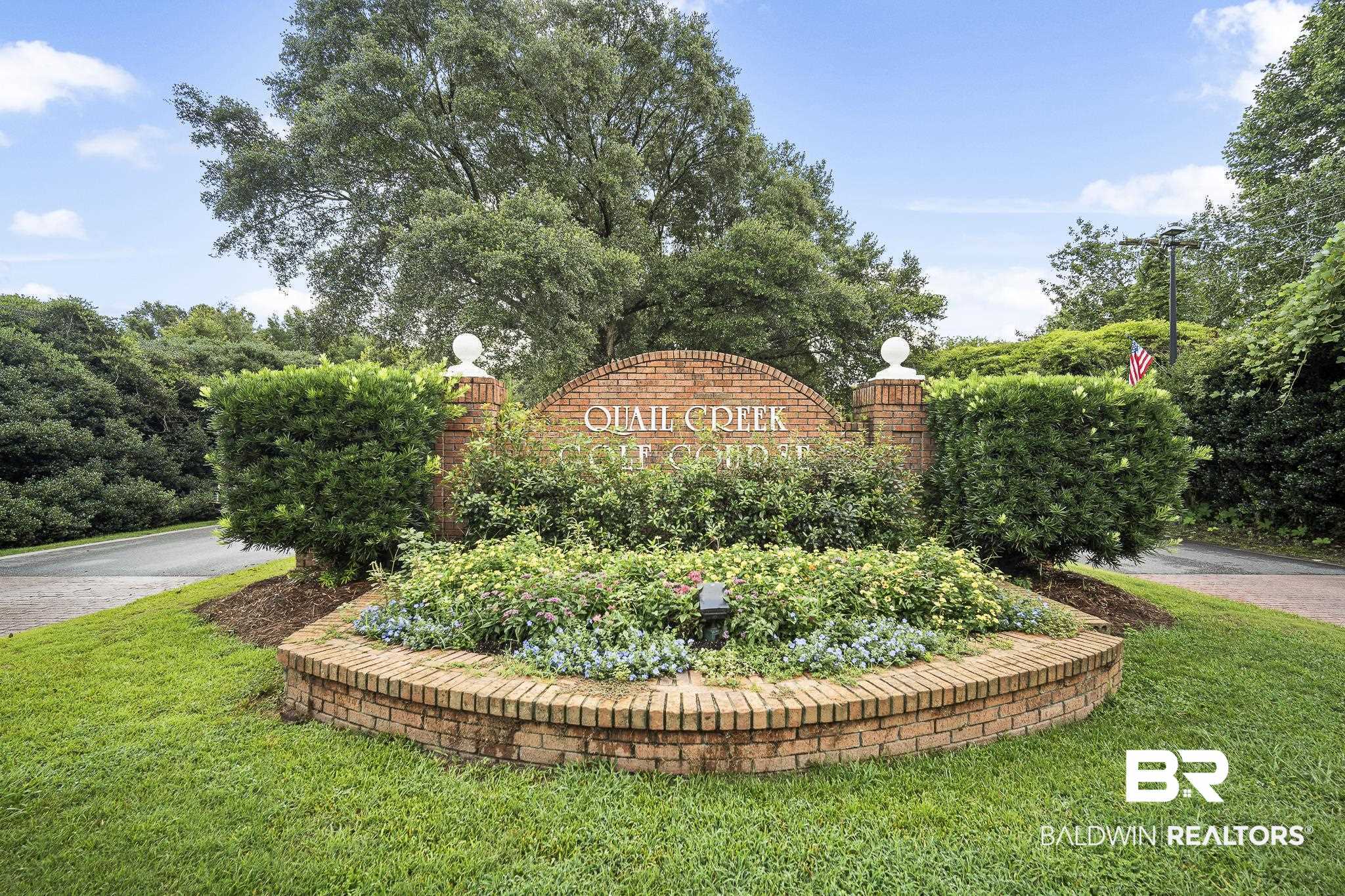 19876 Hunters Loop Fairhope, AL 36532 - Photo 40 of 40 Community / neighborhood sign featuring a lawn