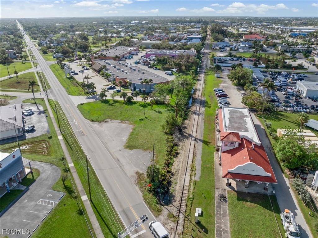 1013 Taylor Road Punta Gorda, FL 33950 - Photo 3 of 5 an aerial view of residential houses with outdoor space and trees