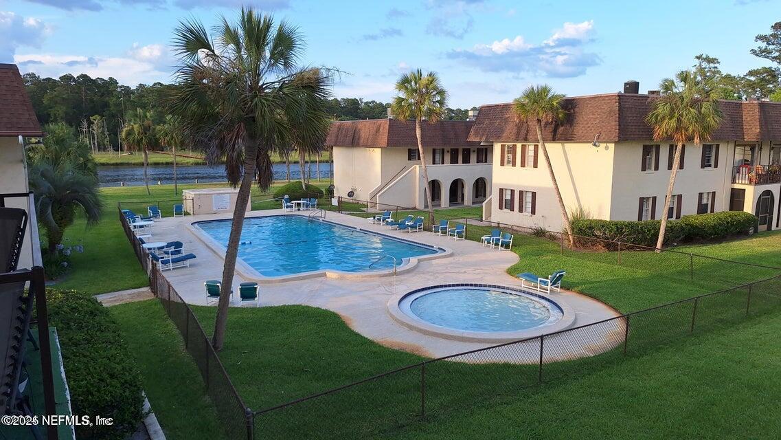 1540 El Prado Road, Unit 3 Jacksonville, FL 32216 - Photo 21 of 26 an aerial view of a house with swimming pool garden and patio