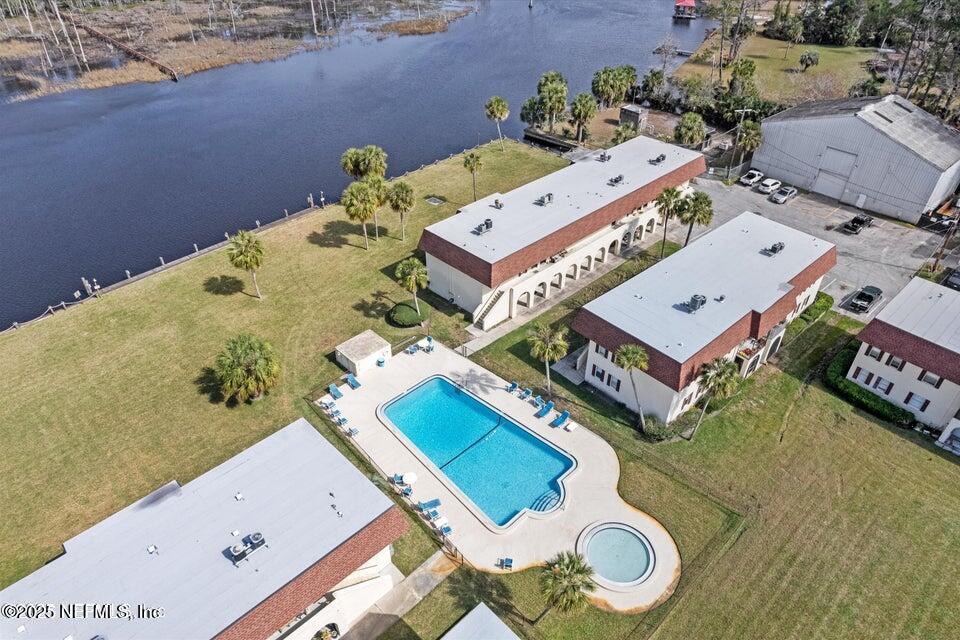 1540 El Prado Road, Unit 3 Jacksonville, FL 32216 - Photo 25 of 26 an aerial view of a house with a swimming pool and outdoor seating