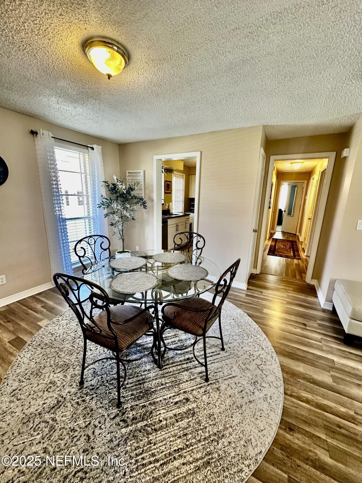 1540 El Prado Road, Unit 3 Jacksonville, FL 32216 - Photo 3 of 26 a view of a dining room with furniture