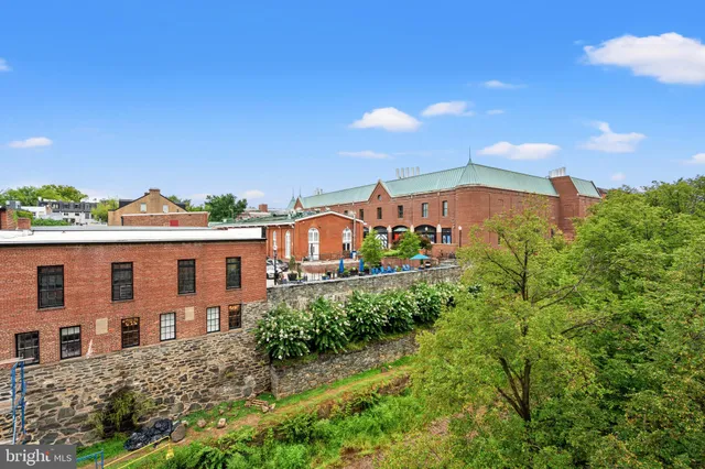 a view of a city with tall buildings