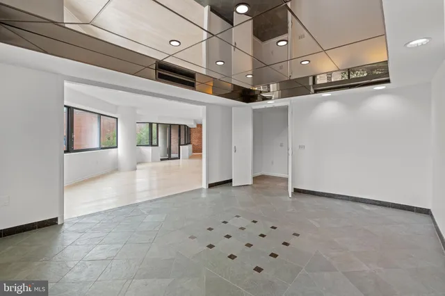 a view of a hallway with entryway